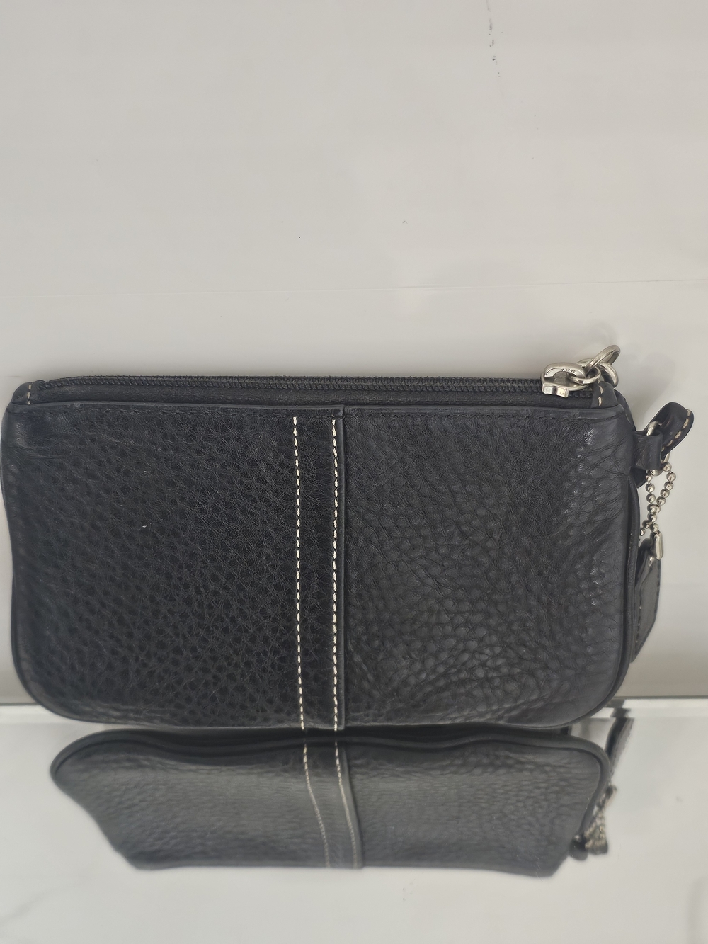 Coach Black Pebbled Leather Wristlet with Contrast Stitching